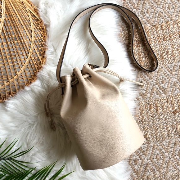 Mossimo Supply Co. Handbags - Mossimo Cream Pebbled Drawstring Bucket Bag